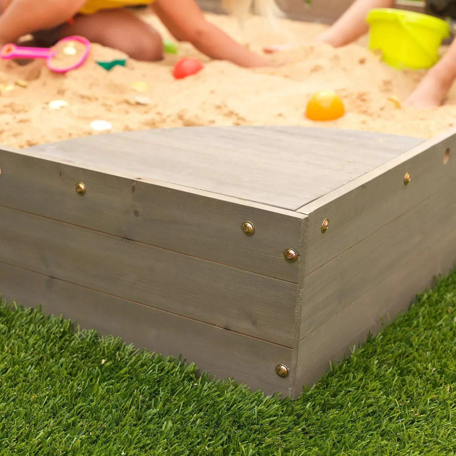 KidKraft Sandbox in the backyard KidKraft